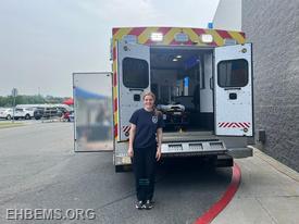 EMT Savina with the ambulance
